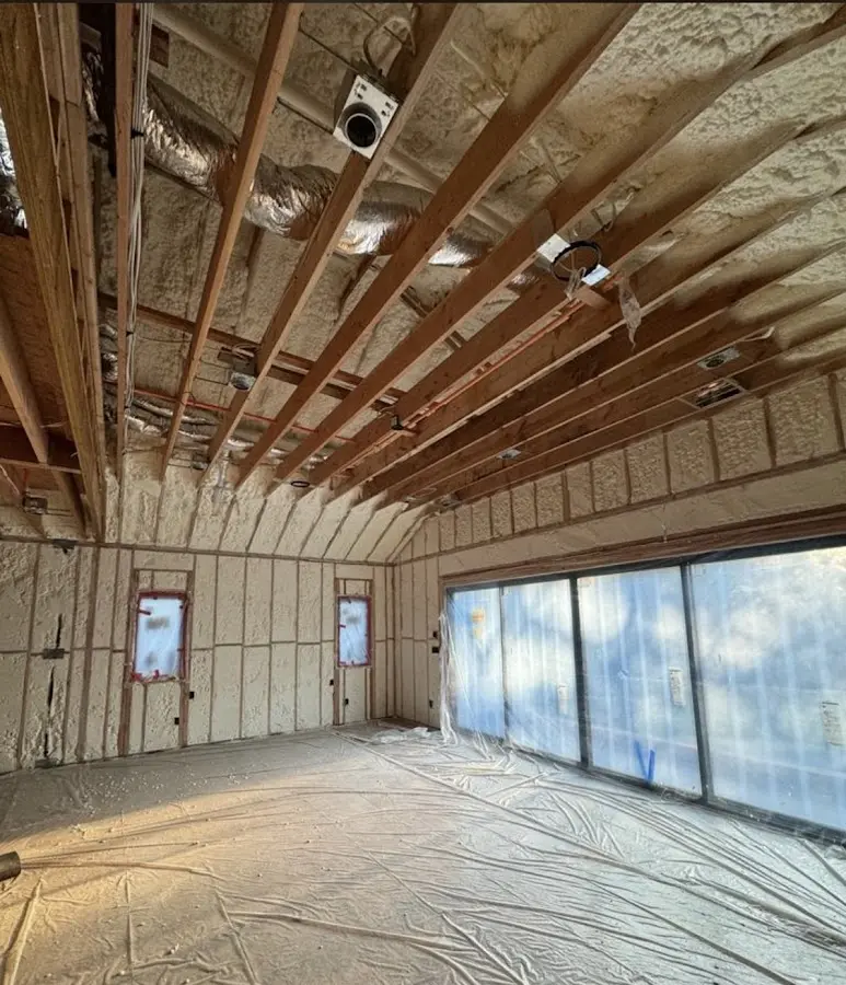 Interior walls and ceiling insulated with spray foam during new construction in Cumru